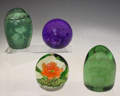 Lot 399 - Two heavy green glass 'Nailsea' dump doorstops, etc.
