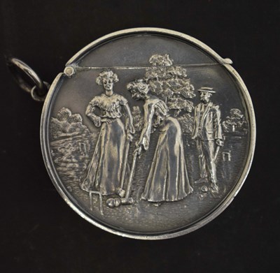 Lot 153 - Edward VII silver vesta case of circular form, with a relief panel depicting a croquet game