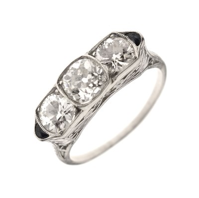 Lot 4 - Art Deco diamond and sapphire unmarked white metal three stone ring
