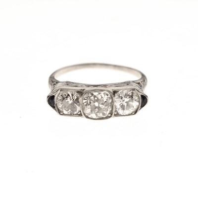 Lot 4 - Art Deco diamond and sapphire unmarked white metal three stone ring