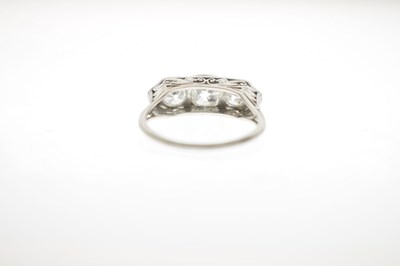 Lot 4 - Art Deco diamond and sapphire unmarked white metal three stone ring