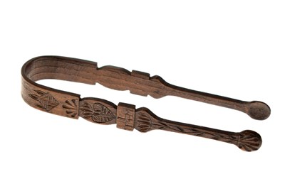 Lot 244 - Pair of dated George III carved wooden 'marriage token' sugar tongs