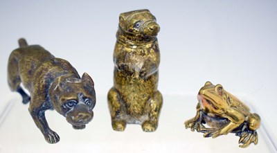 Lot 302 - Cast bronze model of a fighting terrier, muzzled bear, and frog pin cushion