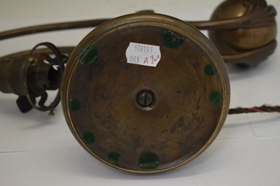Lot 266 - Tiffany Studios, a counter-balance patinated bronze desk lamp with ‘favrile’ glass shade
