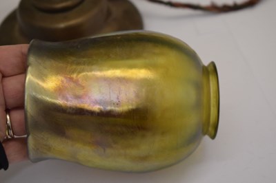 Lot 266 - Tiffany Studios, a counter-balance patinated bronze desk lamp with ‘favrile’ glass shade