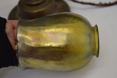 Lot 266 - Tiffany Studios, a counter-balance patinated bronze desk lamp with ‘favrile’ glass shade