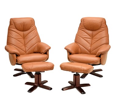 Lot 603 - Pair of modern tan leather swivel chairs with matching footstools