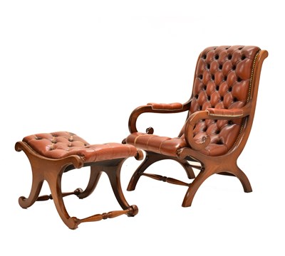 Lot 553 - Reproduction mahogany framed deep-buttoned club armchair and footstool
