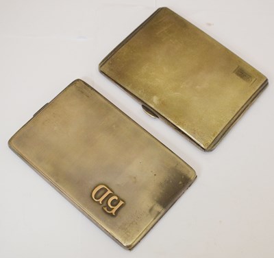 Lot 192 - George V silver cigarette case, and a German white-metal cigarette case