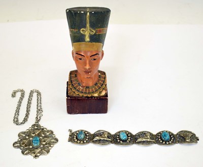 Lot 456 - Egyptian white metal bracelet and pendant together with a plaster bust of Nefertiti