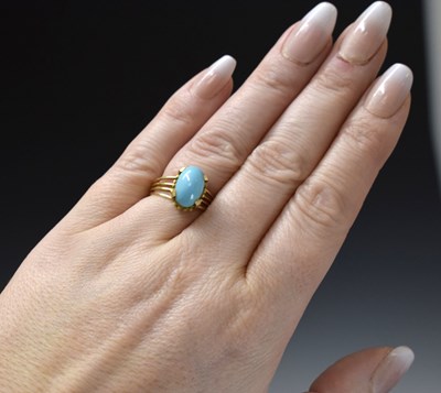 Lot 25 - Iranian turquoise unmarked yellow metal dress ring