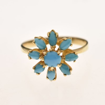 Lot 26 - Iranian turquoise yellow metal flower head dress ring