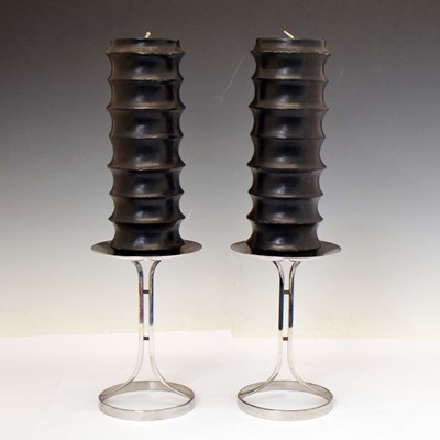 Lot 608 - Pair of Robert Welch stainless steel candlesticks and candles