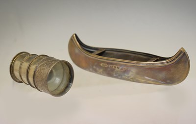 Lot 197 - Late Victorian silver novelty canoe and a white metal miniature telescope