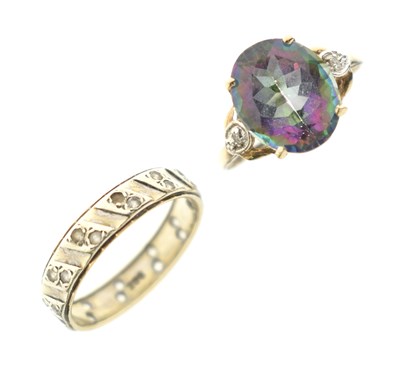 Lot 39 - White stone set wedding band, and a 'mystic topaz' dress ring