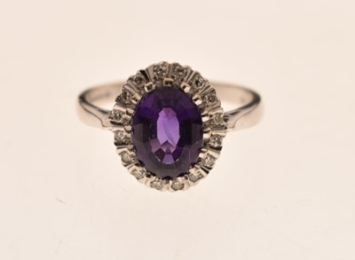 Lot 17 - Amethyst and diamond 18ct white gold cluster ring