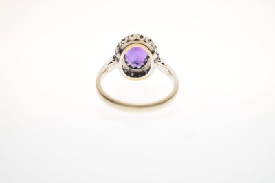Lot 17 - Amethyst and diamond 18ct white gold cluster ring