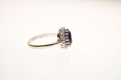 Lot 17 - Amethyst and diamond 18ct white gold cluster ring