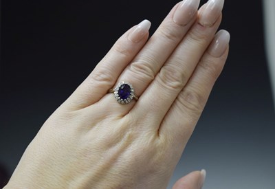 Lot 17 - Amethyst and diamond 18ct white gold cluster ring
