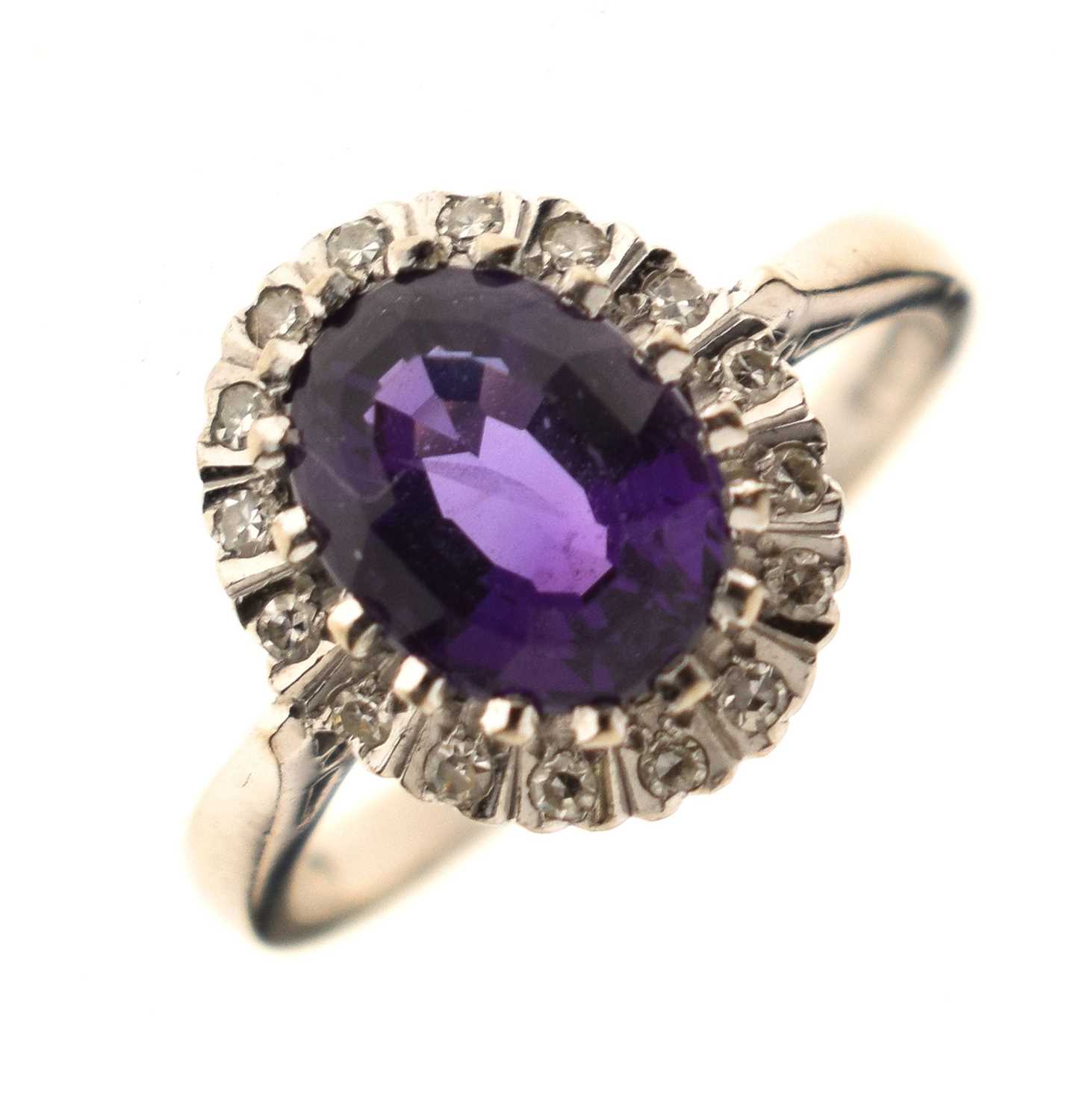 Lot 17 - Amethyst and diamond 18ct white gold cluster ring
