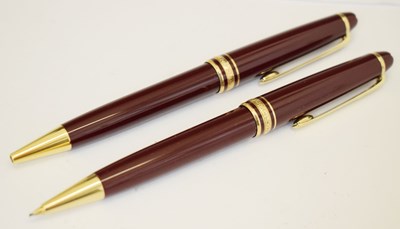 Lot 314 - Montblanc Meisterstück rollerball and mechanical pencil in burgundy red and gilt finish