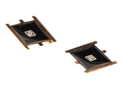 Lot 98 - Pair of diamond and black onyx rose metal cufflinks