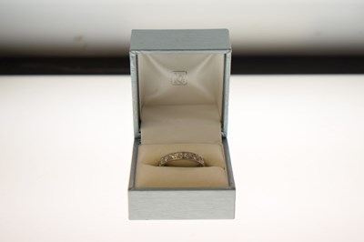 Lot 6 - Diamond platinum full eternity ring