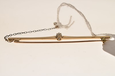 Lot 33 - Early 20th century diamond unmarked rose and white metal bar brooch
