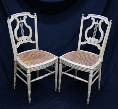 Lot 559 - Pair of French cream painted lyre back chairs