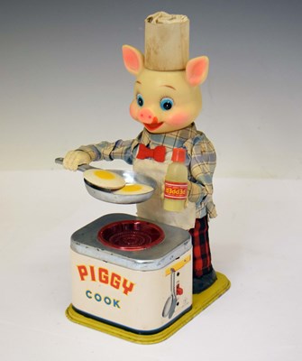 Lot 505 - Yonezawa Japanese tinplate battery-operated 'Piggy Cook'