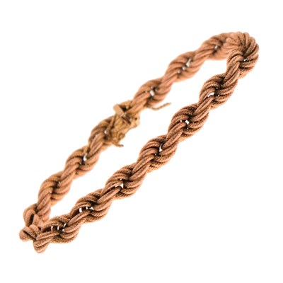 Lot 111 - Continental yellow metal (375) 'rose gold' rope link bracelet