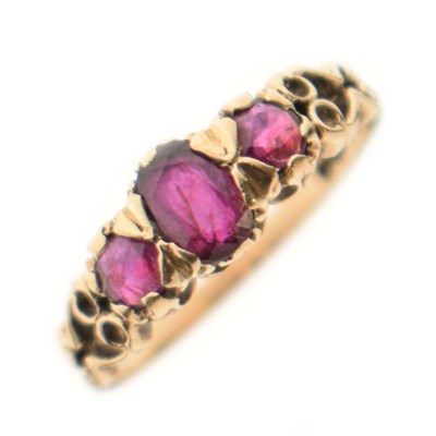 Lot 26 - 9ct gold three stone ruby ring