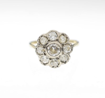 Lot 7 - Early 20th century diamond yellow and white metal flower head cluster ring