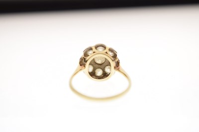 Lot 7 - Early 20th century diamond yellow and white metal flower head cluster ring