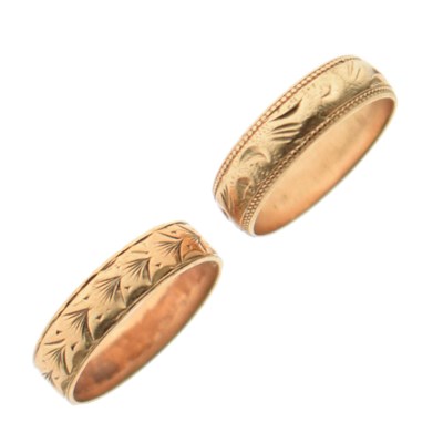 Lot 61 - Two 9ct gold engraved wedding bands