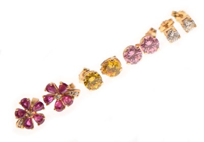 Lot 125 - Four pairs of gem-set ear studs