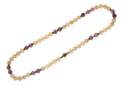 Lot 105 - Amethyst and quartz beaded necklace