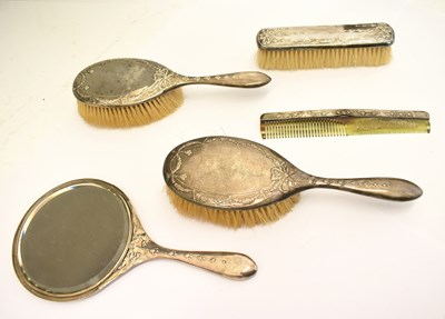 Lot 234 - Five piece Edwardian silver backed dressing table set, with neo-classical decoration