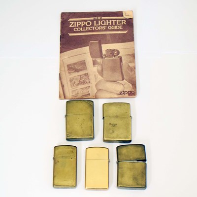 Lot 397 - Collection of five brass vintage Zippo Lighters
