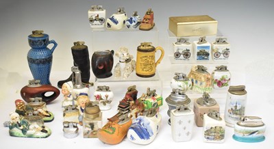 Lot 404 - Collection of ceramic and other cased vintage table lighters
