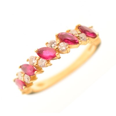 Lot 15 - Ruby and diamond 18ct gold dress ring