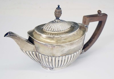 Lot 261 - Late Victorian 'batchelor's' silver teapot with gadroon decoration