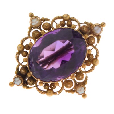Lot 52 - 19th century Cannetille amethyst and seed pearl yellow metal brooch