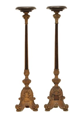 Lot 524 - Pair of Continental carved pine and fruitwood torchères