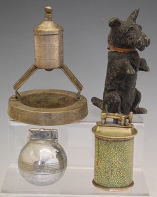 Lot 322 - Four novelty table lighters