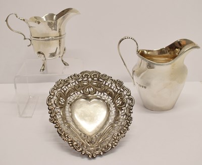 Lot 208 - Two silver jugs and a bonbon dish