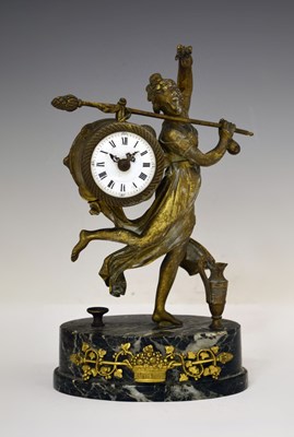 Lot 487 - Early to mid 19th century French Empire 'Dancing Bacchante' gilt brass and marble mantel clock