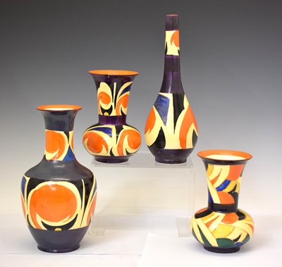 Lot 575 - Arabian an Arcadian Ware, four vases in the manner of Frederick Rhead painted Art Deco orange