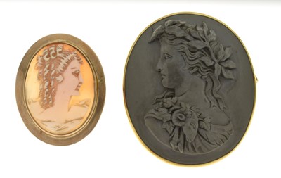 Lot 75 - Lava stone cameo brooch and a shell cameo brooch