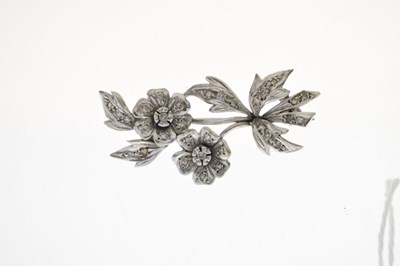 Lot 35 - Diamond unmarked white metal floral spray brooch